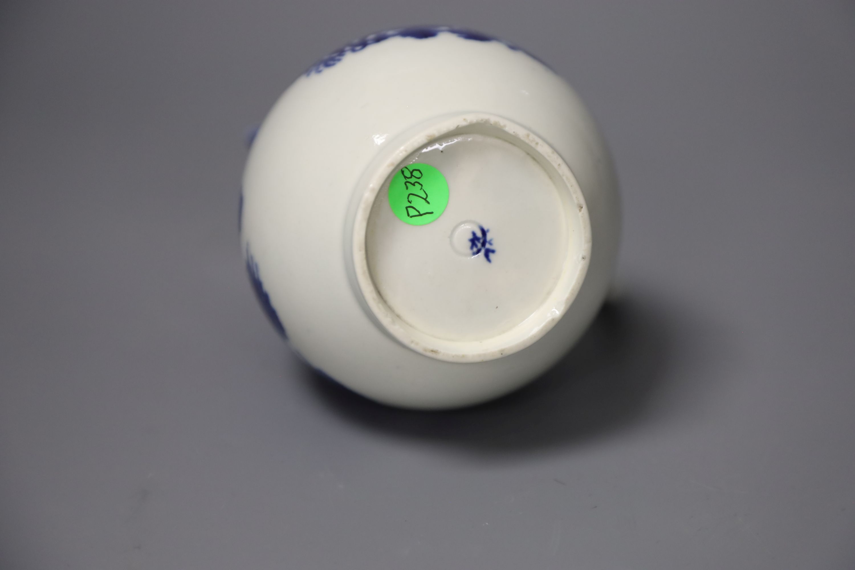 An 18th century Worcester sparrow beak jug with the Argument pattern in blue, disguised numeral mark, height 12cm